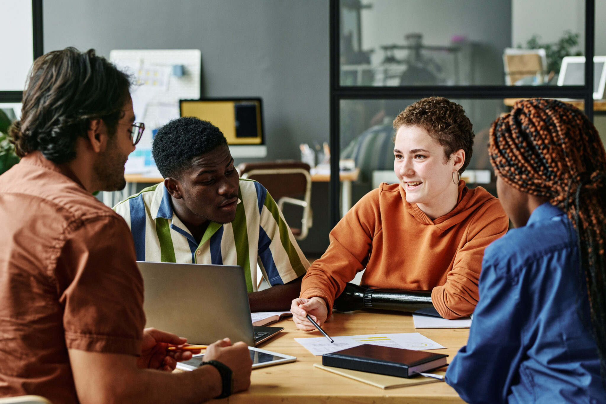 People collaborating around a table